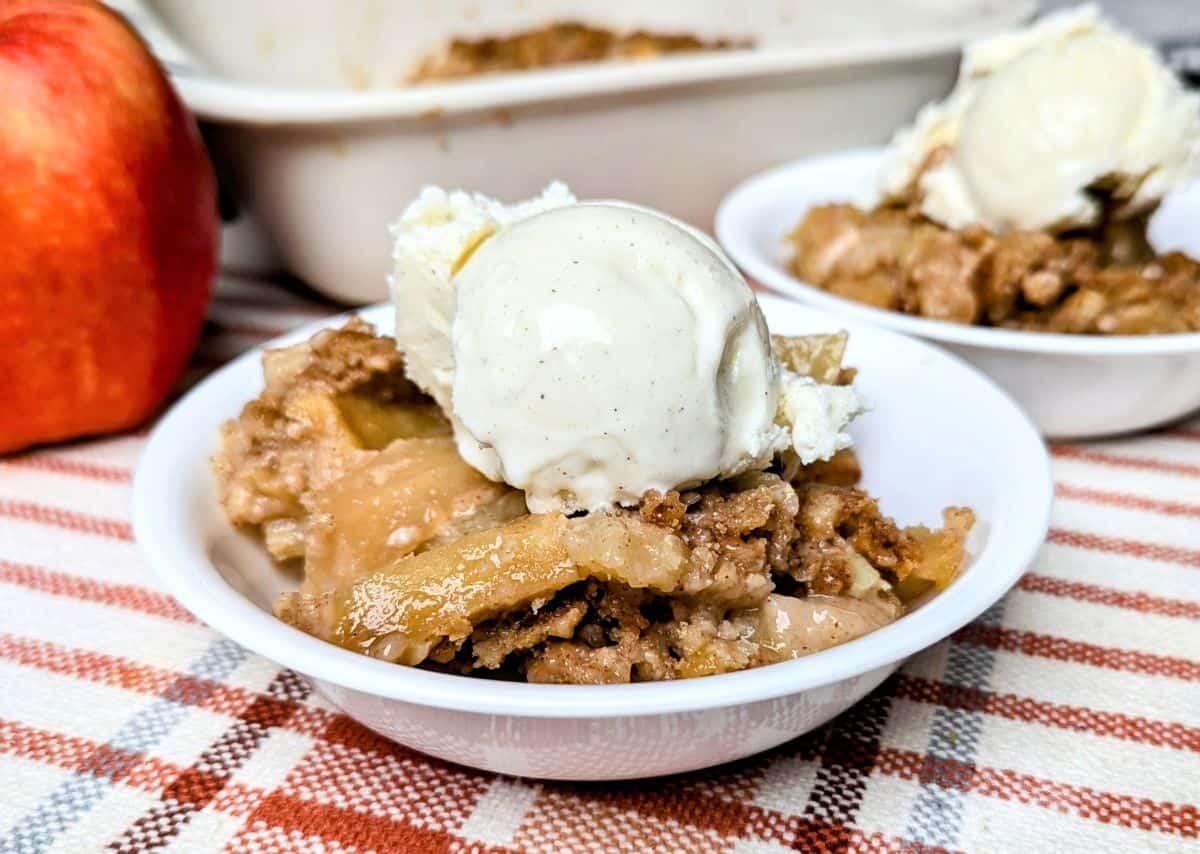 apple cobbler serving in bowl