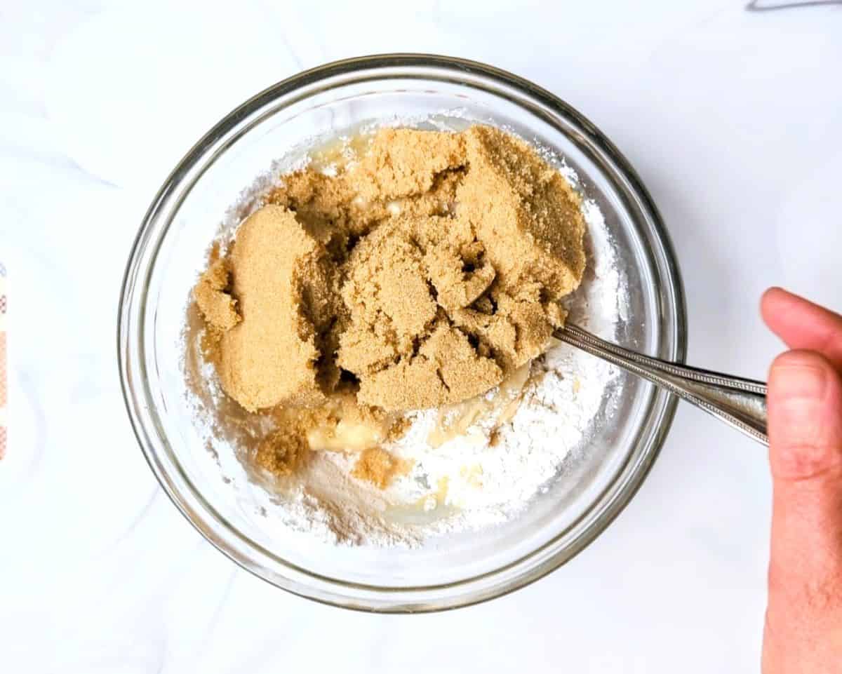 folding in brown sugar and cinnamon