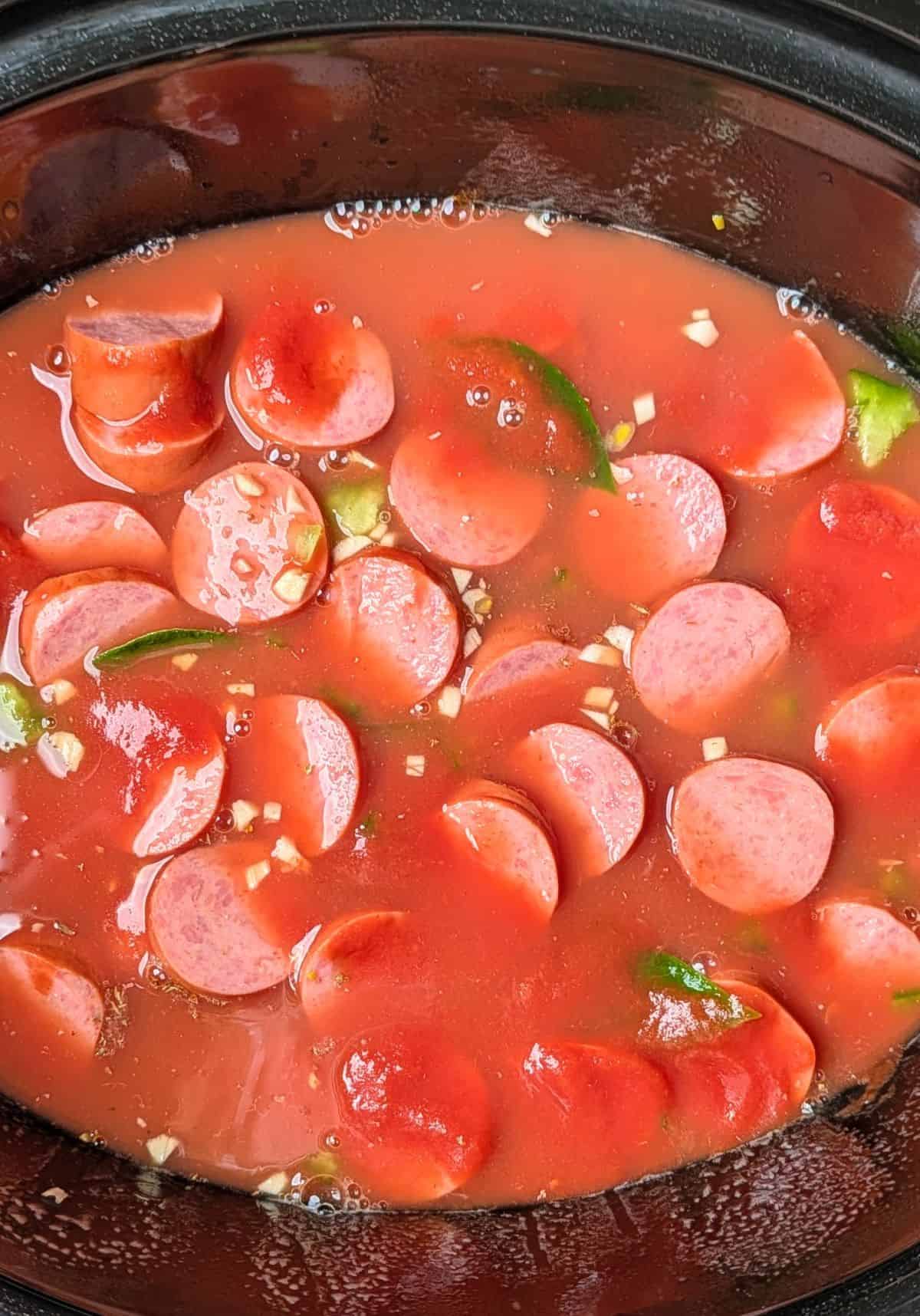 sausage broth tomato sauce and tomatoes added