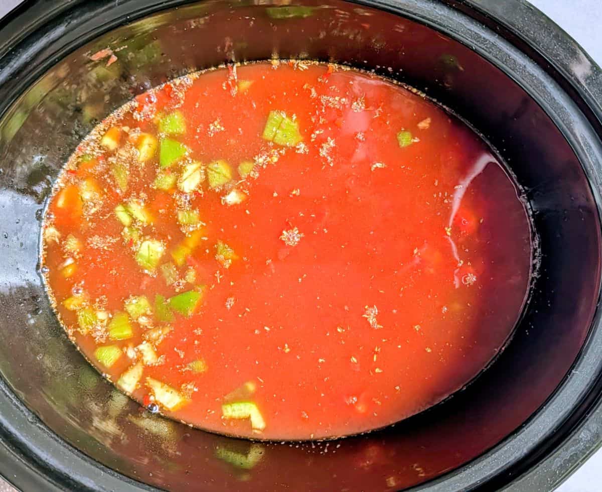 beef broth and tomatoes added, along with pizza sauce