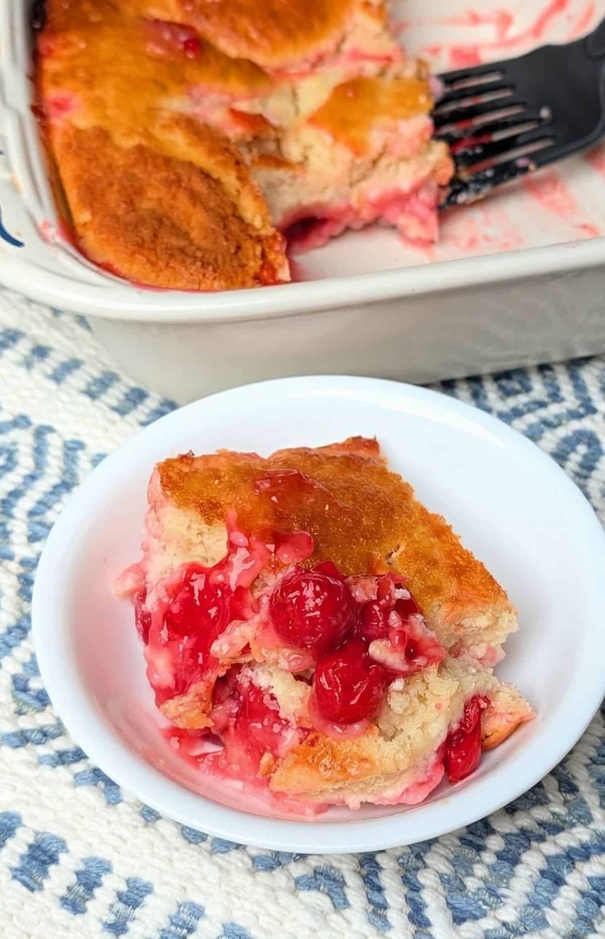 pudding cake in bowl with pan in background