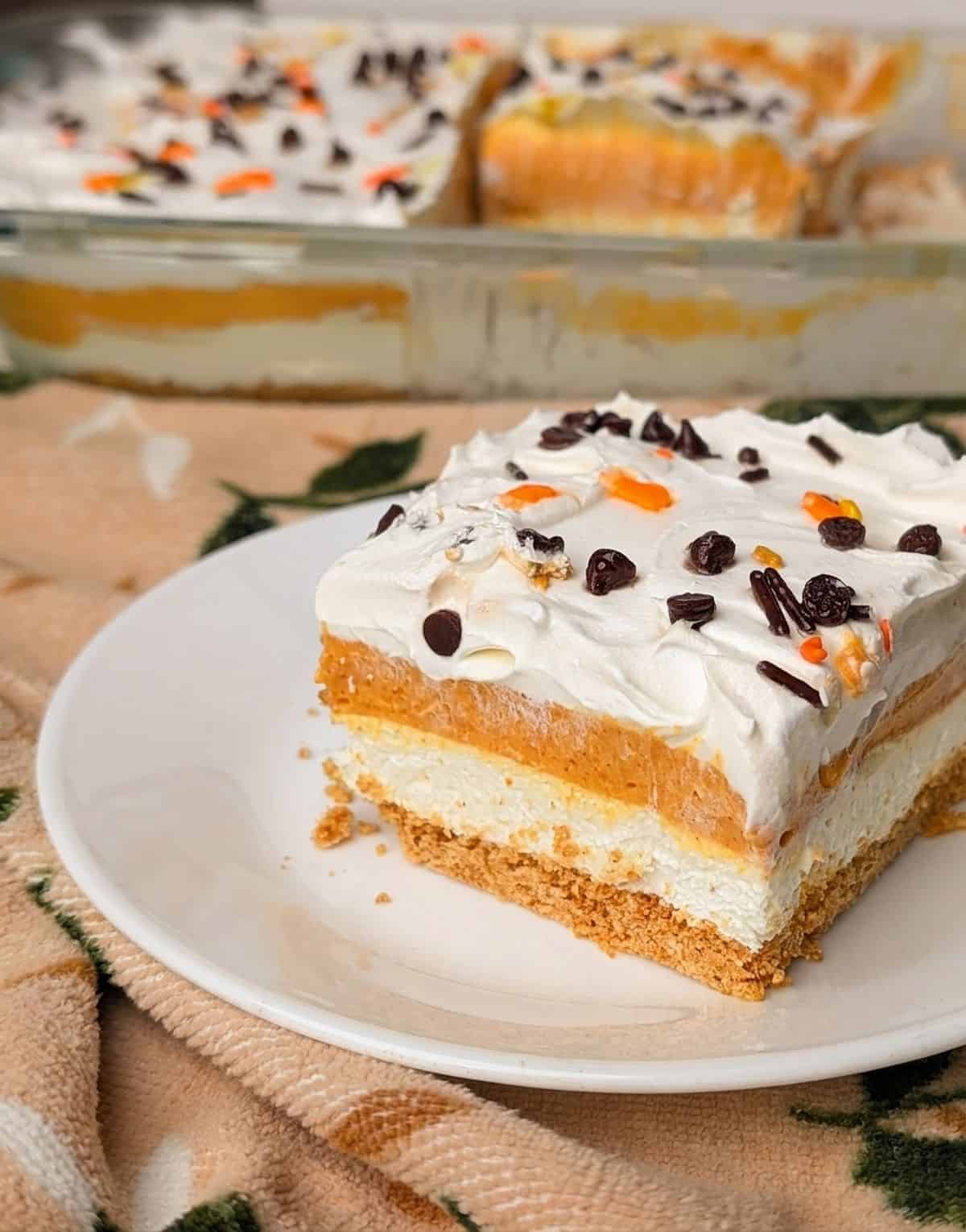 pumpkin lush pie recipe on plate so you can see all four layers