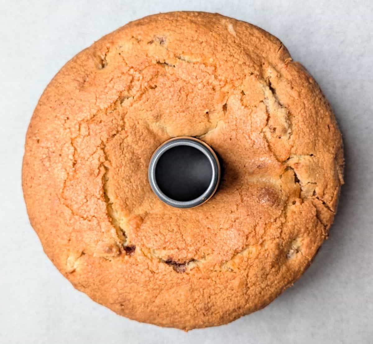 cake after baking and side pan removed to cool further