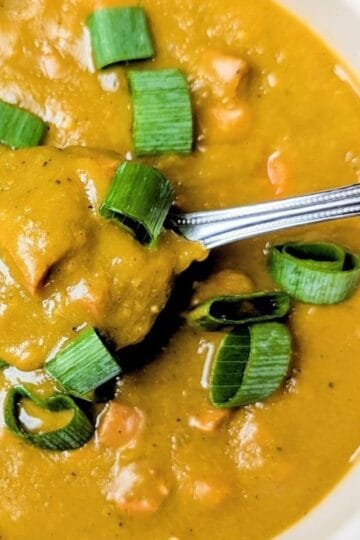 slow cooker recipe for split pea and ham soup serving in bowl